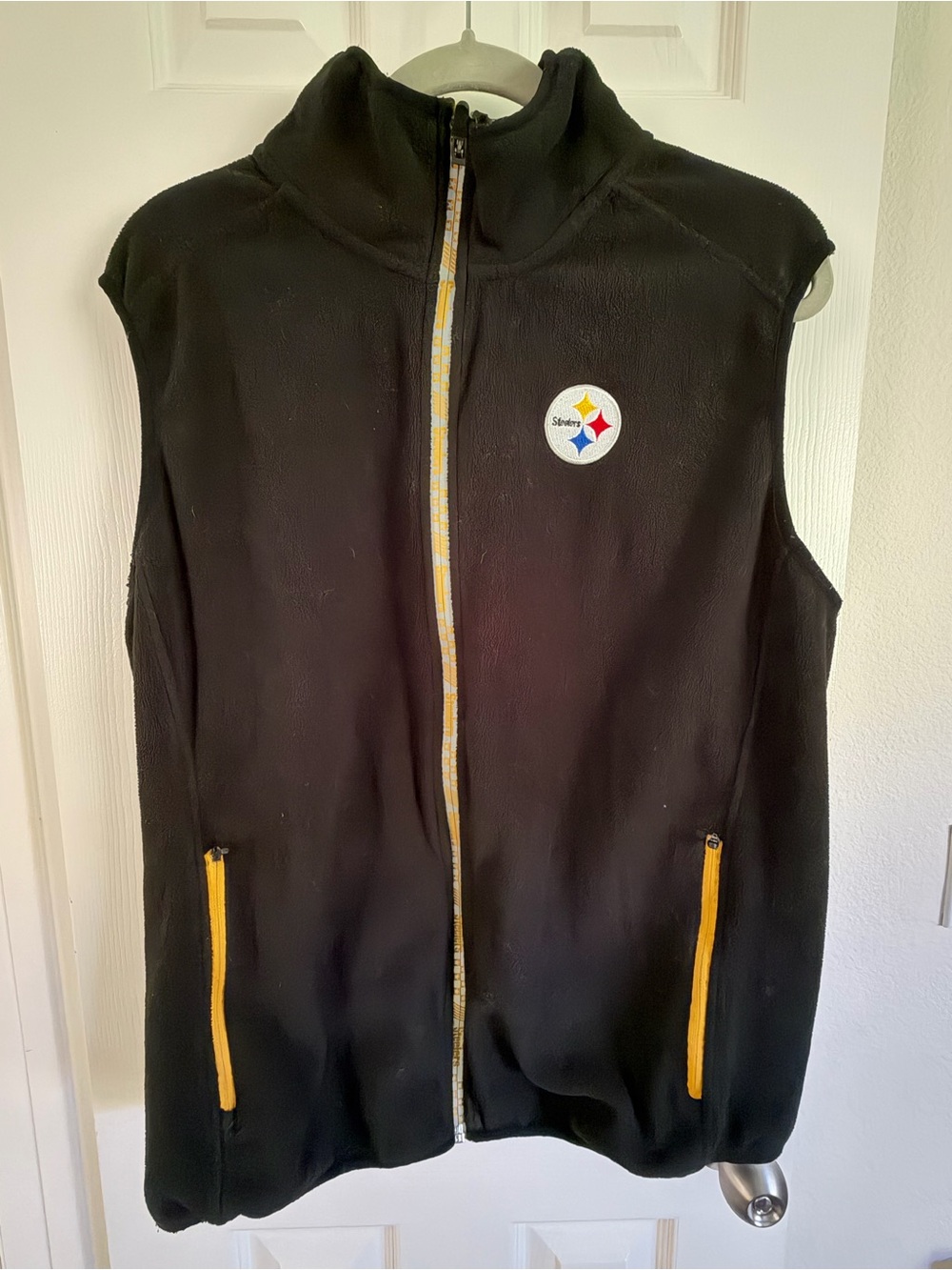 NFL Team Apparel Pittsburgh Steelers Logo Black Fleece Vest with Gold Trim